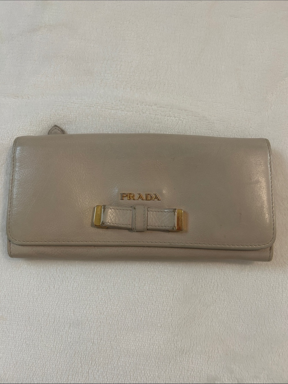 Prada Taupe Leather Bow-Accent Wallet with Gold Hardware
